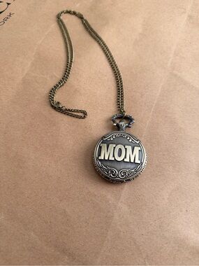 a vintage-style "MOM" engraved quartz pocket watch pendant necklace